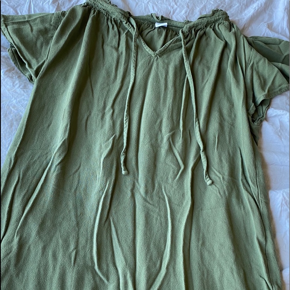 green flowy shirt with tie collar